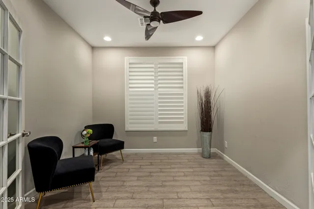 a view of backyard with outdoor seating