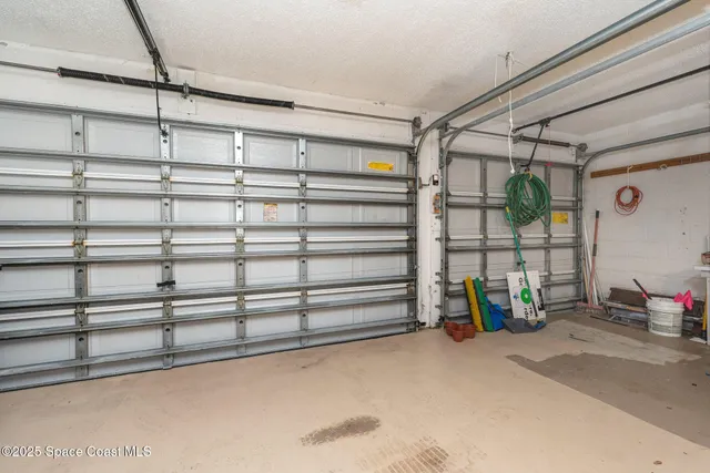 a spacious bathroom with 2 sink bathtub and window