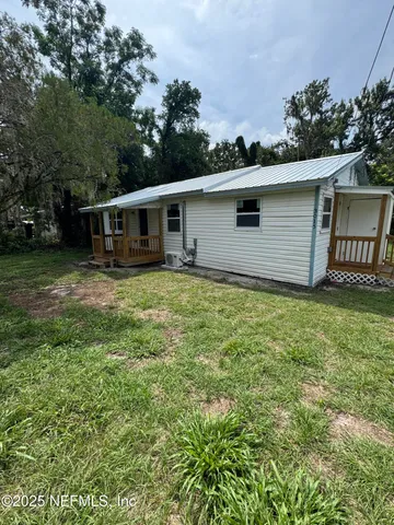 front view of house with a yard