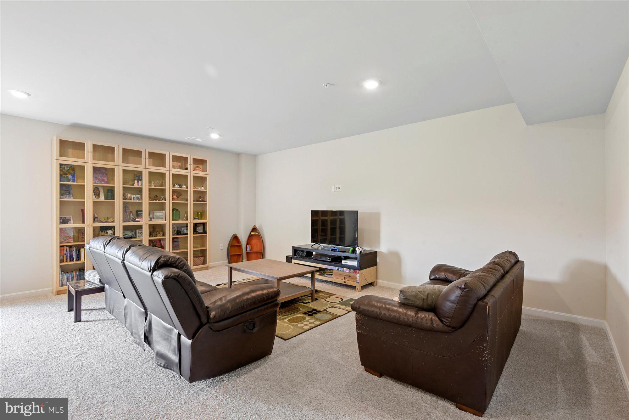 691 Stonegate Road Westminster, MD 21157 - Photo 31 of 36 Finished basement family room
