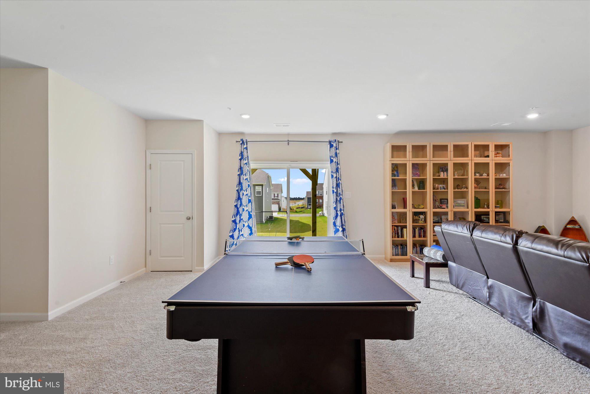 691 Stonegate Road Westminster, MD 21157 - Photo 32 of 36 Tons of space and walkout in finished basement.