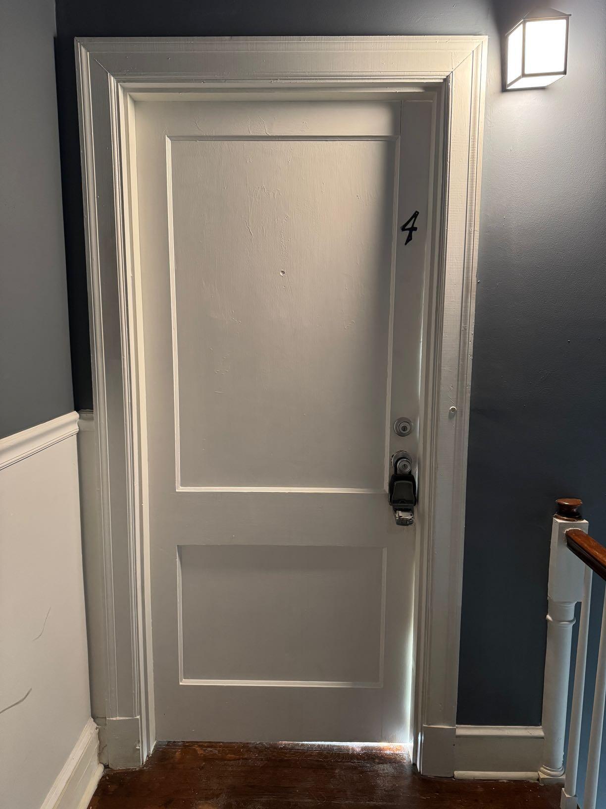 a bathroom with a glass shower door