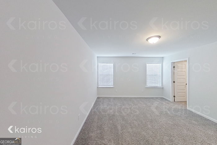 205 Redwood Court Springfield, GA 31329 - Photo 6 of 13 a view of an empty room