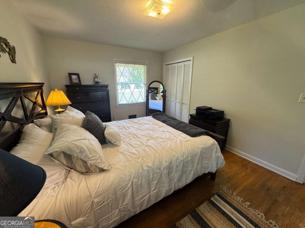 149 Caroline Avenue Athens, GA 30606 - Photo 18 of 42 a bedroom with a bed and window