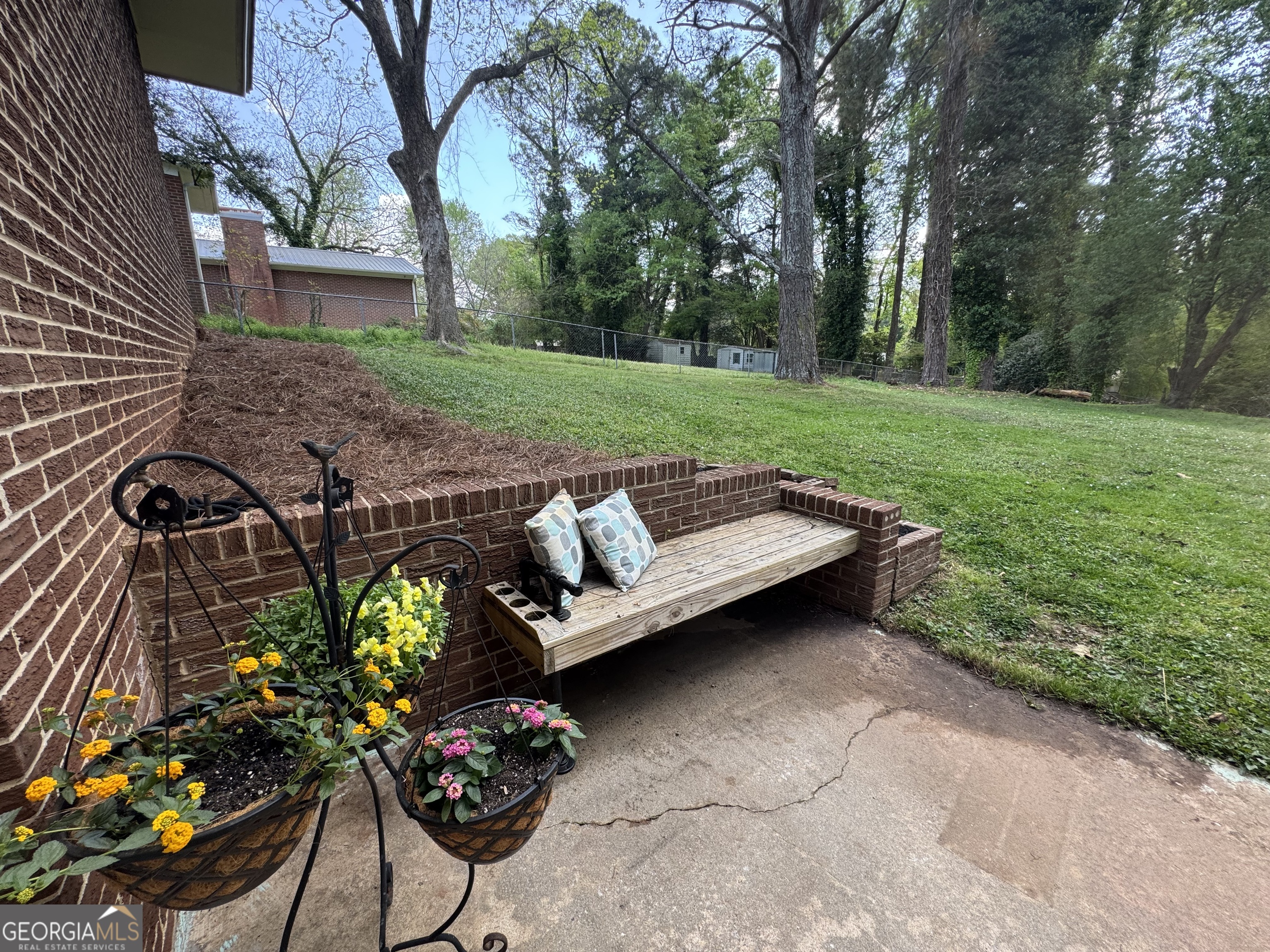 149 Caroline Avenue Athens, GA 30606 - Photo 36 of 42 a backyard of a house with lots of green space