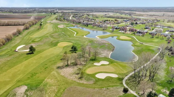 a view of a swimming pool and an outdoor space