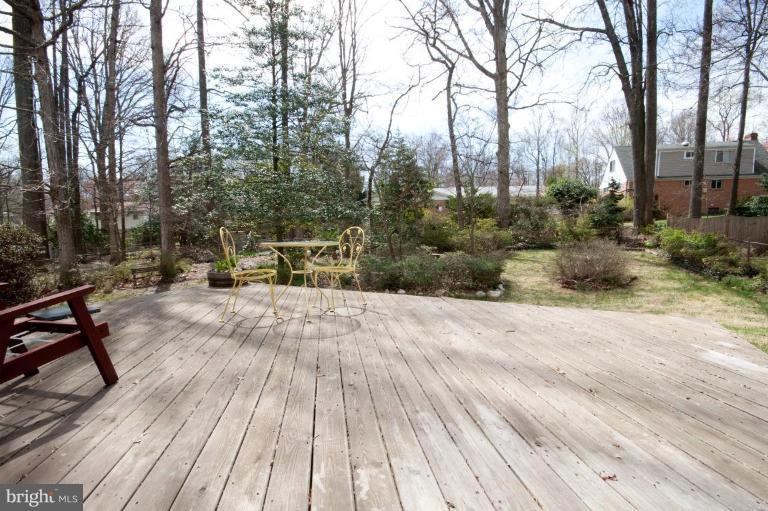 5510 Callander Drive Springfield, VA 22151 - Photo 16 of 17 a view of outdoor space with deck and trees
