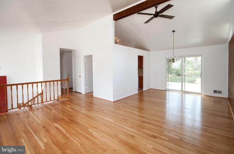 5510 Callander Drive Springfield, VA 22151 - Photo 4 of 17 a view of a livingroom with wooden floor and a window