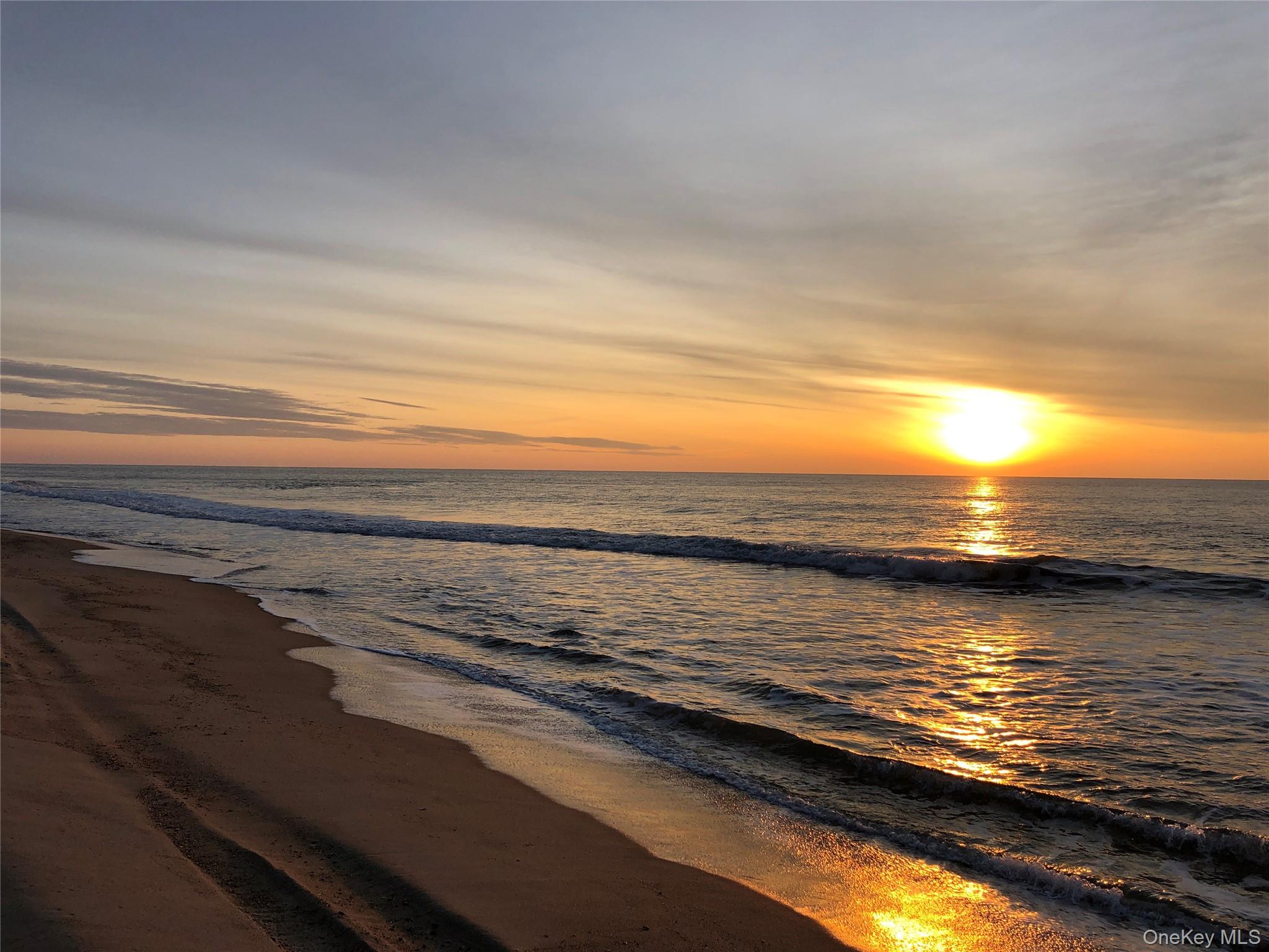 623 Lazy Point Road Amagansett, NY 11930 - Photo 9 of 9 a view of an ocean beach