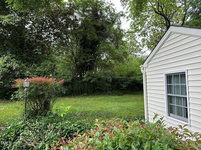 a view of a house with a garden