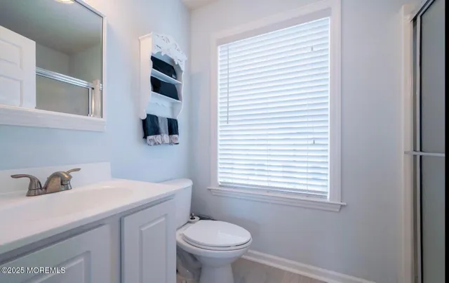 a bathroom with a sink and a toilet