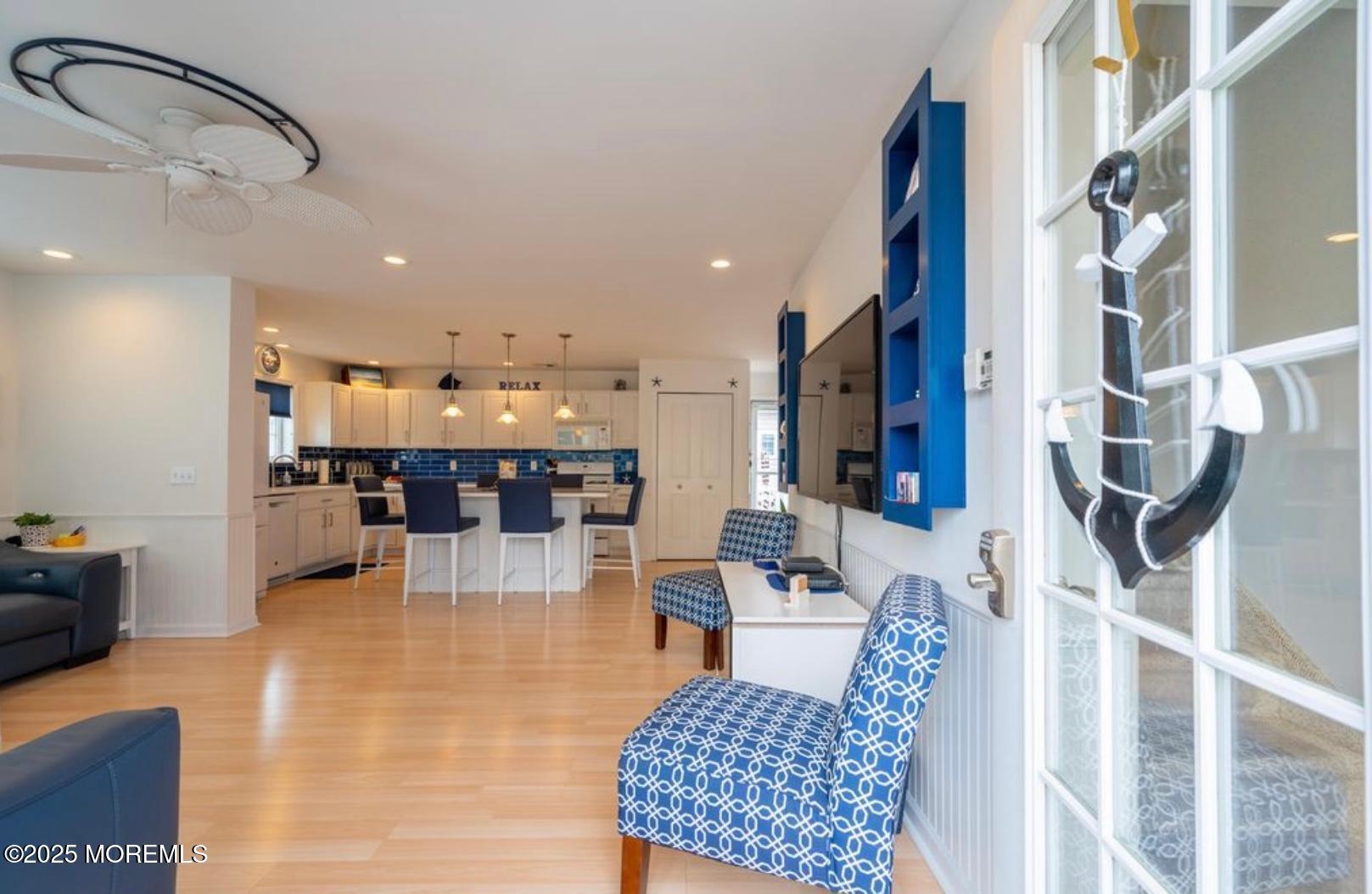 136 Joseph Street Lavallette, NJ 08735 - Photo 2 of 24 a living room with lots of furniture and kitchen view
