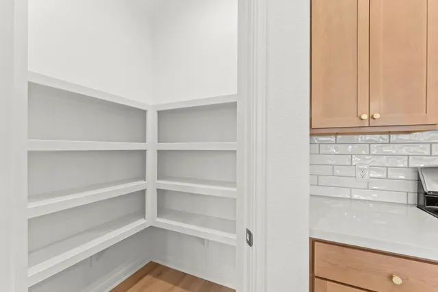 a view of storage and utility room