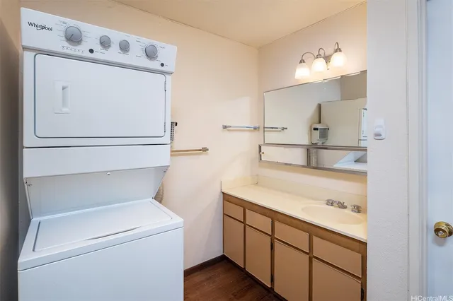 a bathroom with a sink a vanity and mirror