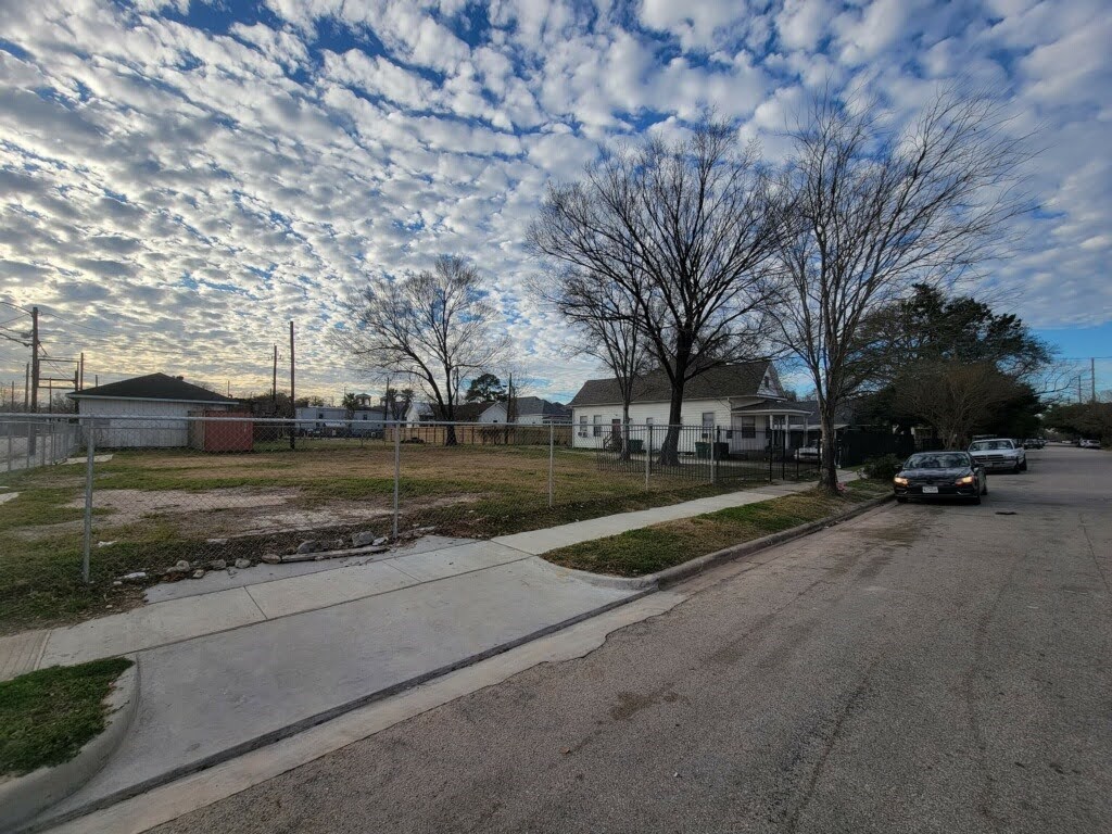 1905 Chapman Street Houston, TX 77009 - Photo 2 of 16 a view of road with trees