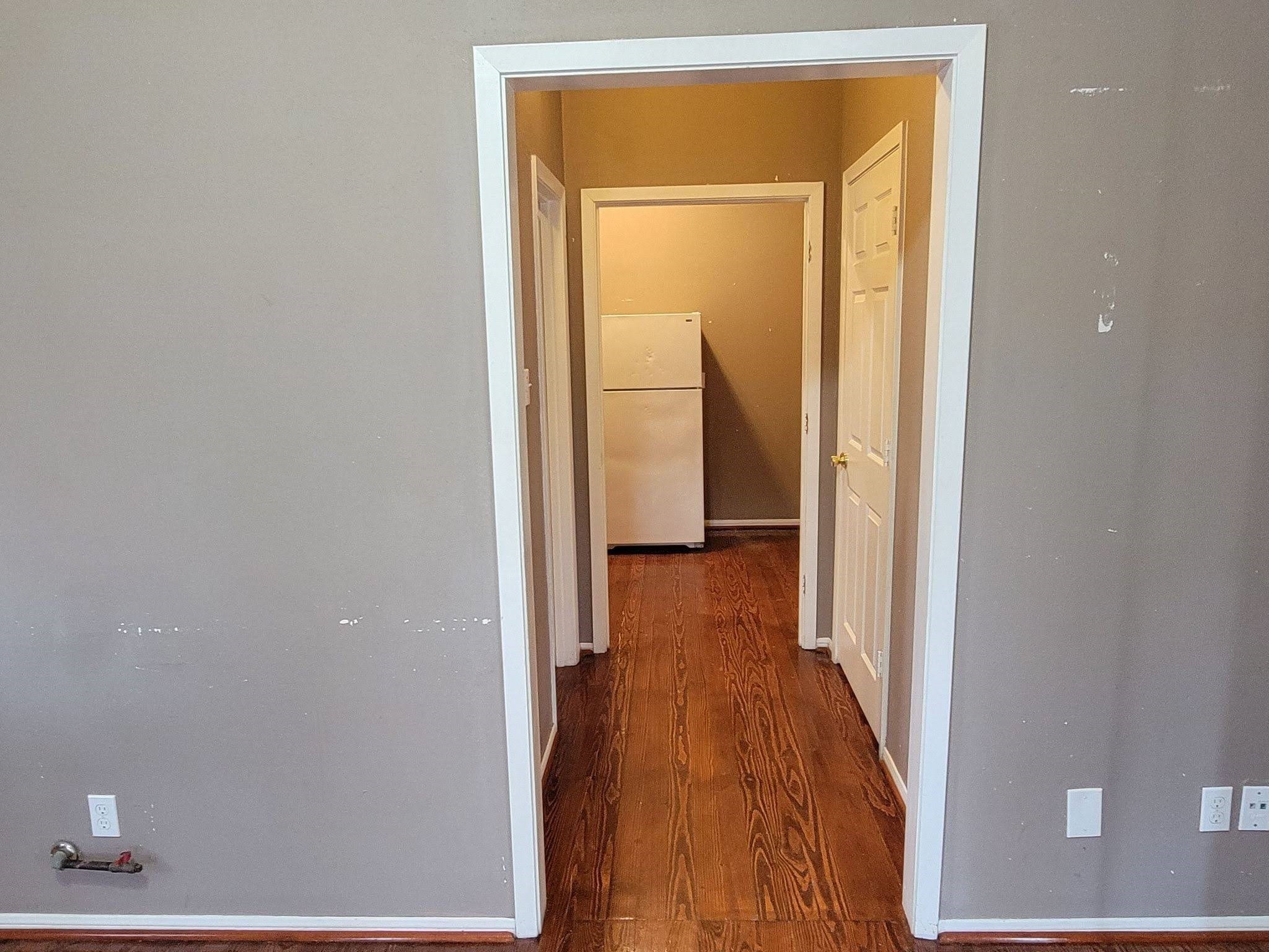 1905 Chapman Street Houston, TX 77009 - Photo 9 of 16 a view of a bathroom from a hallway