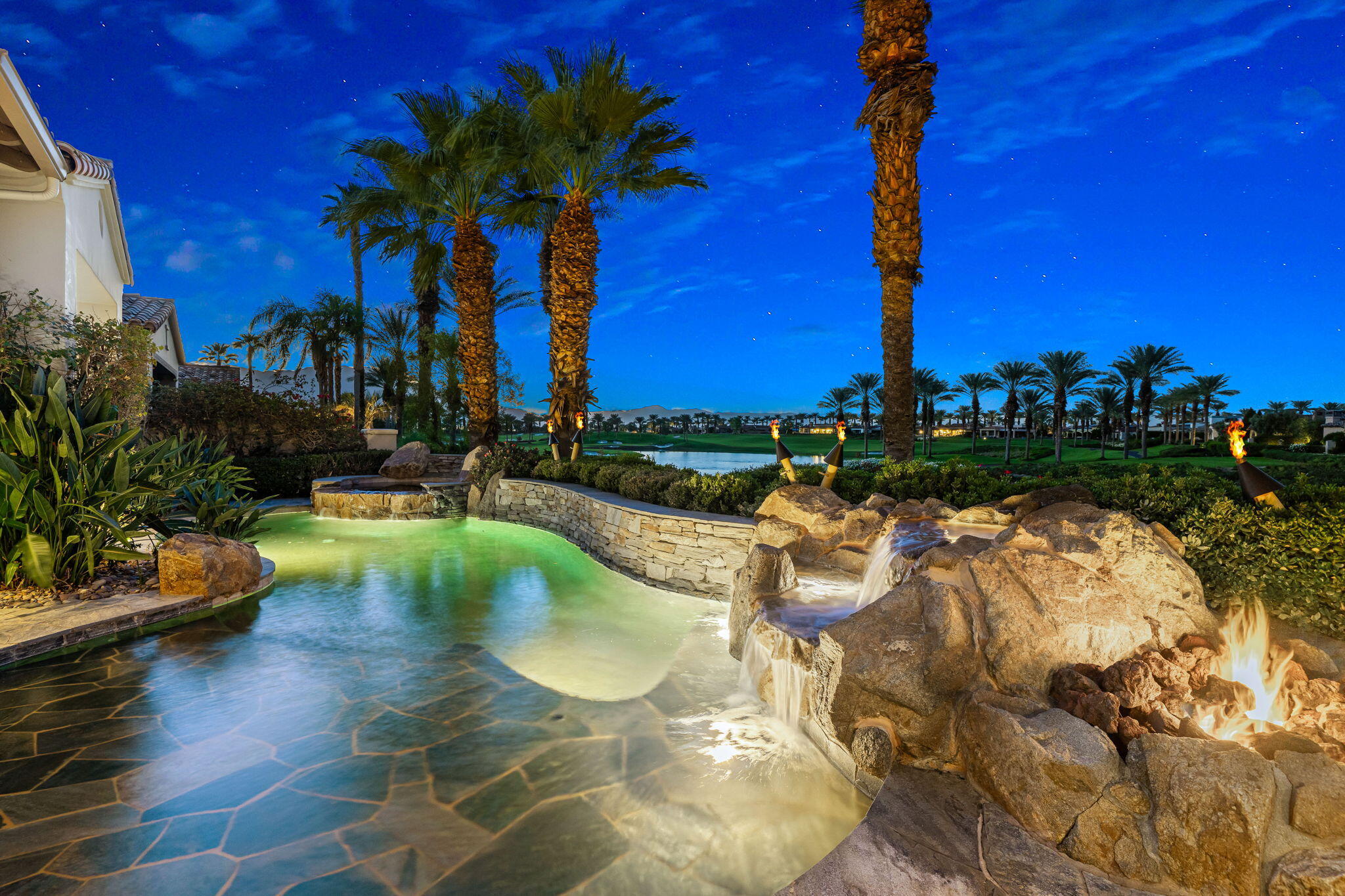 75836 Via Cortona Indian Wells, CA 92210 - Photo 106 of 113 a view of a lake with a house