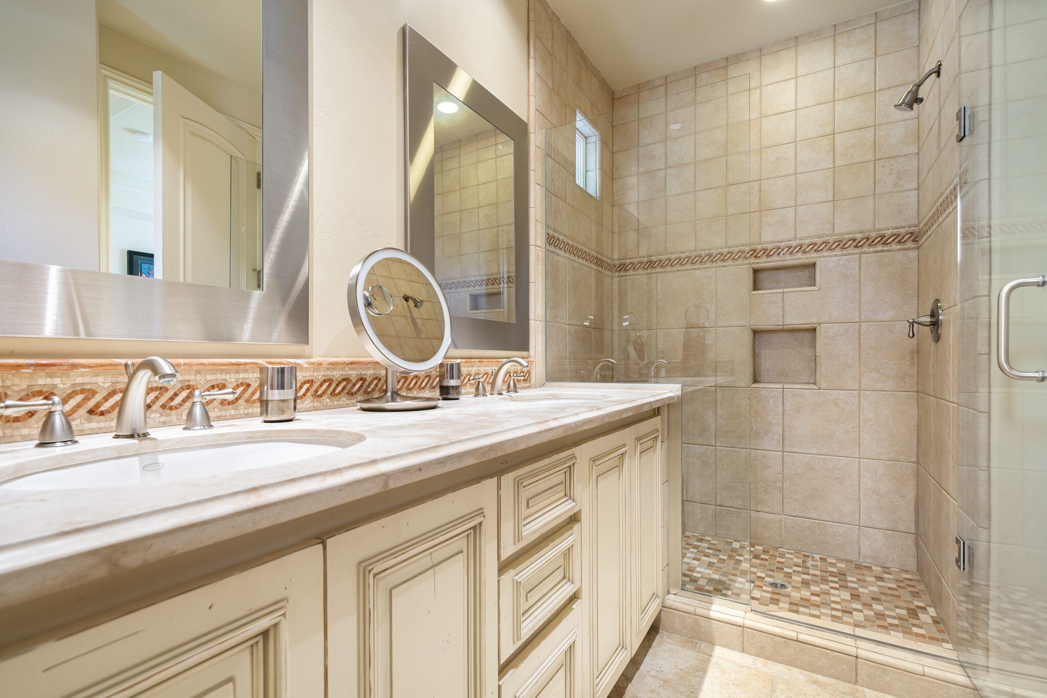 75836 Via Cortona Indian Wells, CA 92210 - Photo 75 of 113 a bathroom with a sink and a mirror