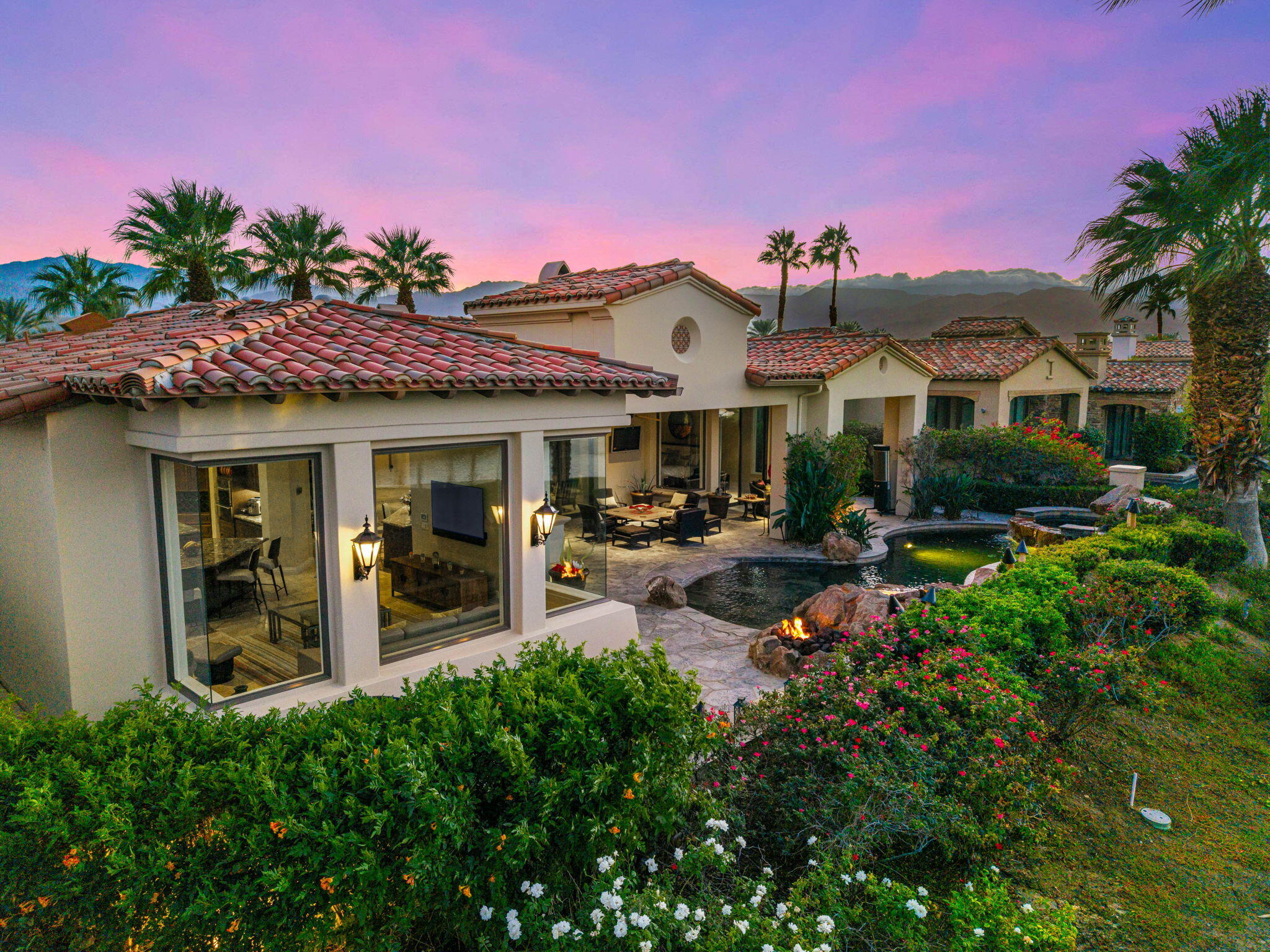 75836 Via Cortona Indian Wells, CA 92210 - Photo 82 of 113 a view of a house with sitting area and garden