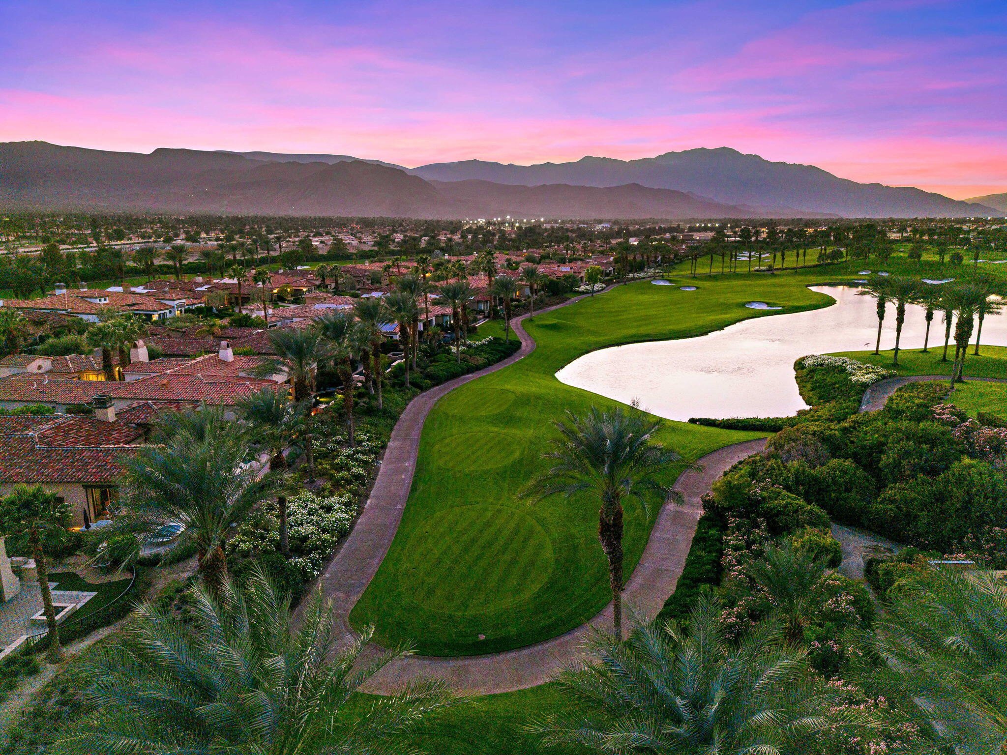 75836 Via Cortona Indian Wells, CA 92210 - Photo 86 of 113 a view of a lake with a mountain in the background