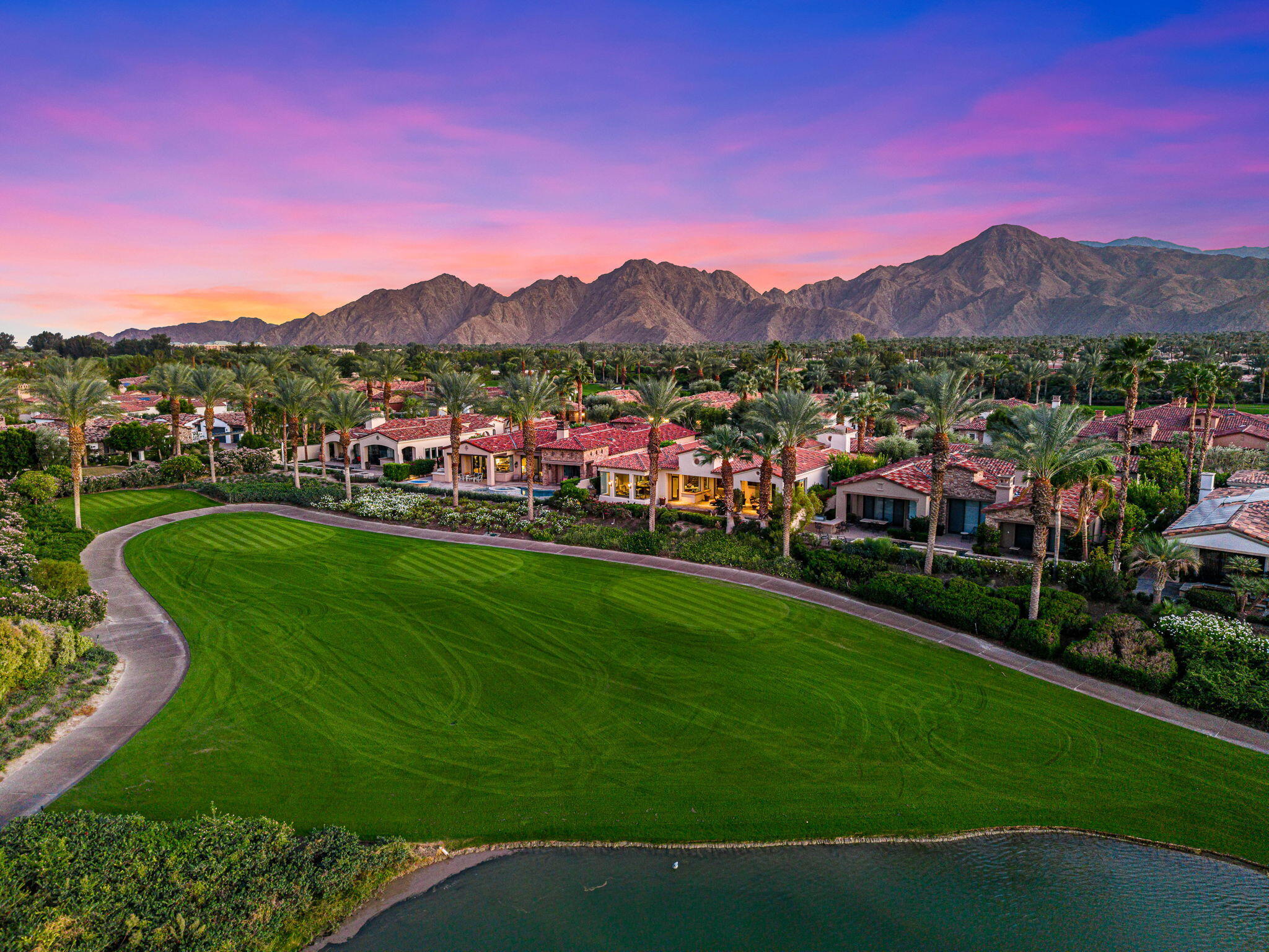 75836 Via Cortona Indian Wells, CA 92210 - Photo 87 of 113 a view of a lush green hillside and houses