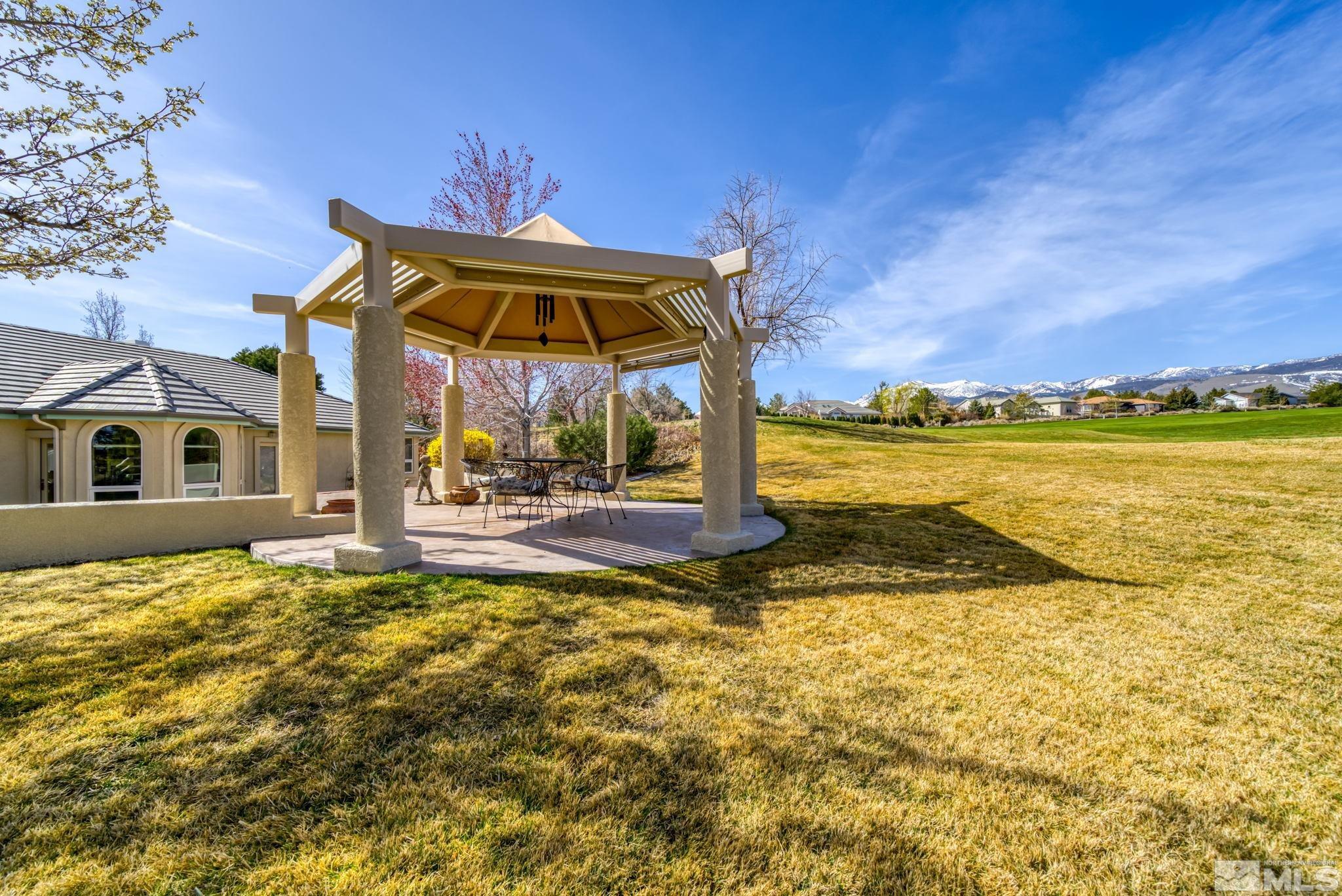 1335 Wolf Run Road Reno, NV 89511 - Photo 8 of 37 a view of a house with a ocean view