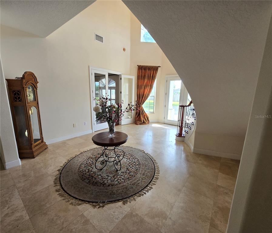 19153 Geraci Road Lutz, FL 33558 - Photo 21 of 21 a view of a living room and dining room