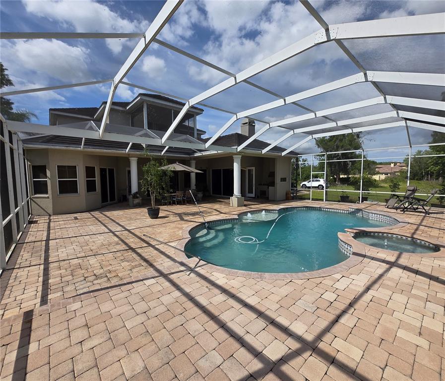 19153 Geraci Road Lutz, FL 33558 - Photo 5 of 21 a view of a backyard of a house