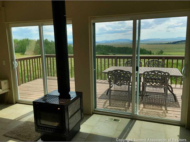 1469 Sheep Ridge Road Fairplay, CO 80440 - Photo 16 of 20 a balcony with table and chairs