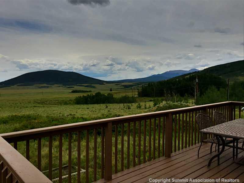 1469 Sheep Ridge Road Fairplay, CO 80440 - Photo 20 of 20 a balcony with wooden floor and yard