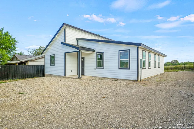 a view of backyard of house