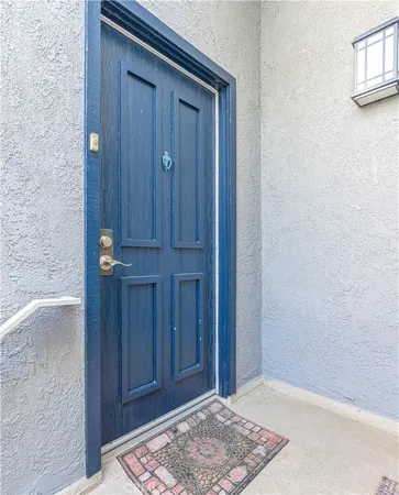 a view of a balcony with wooden floor