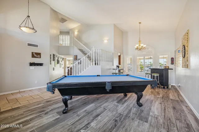 an aerial view of a house with a lake view