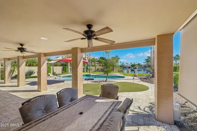 a room with gym equipment and a view of living room