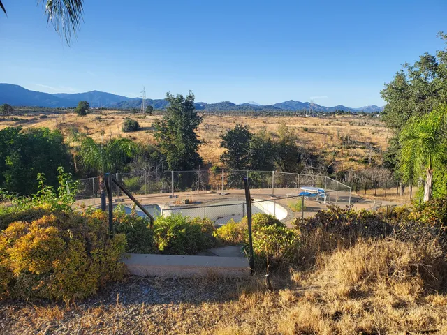 a view of a lake with a mountain in the background