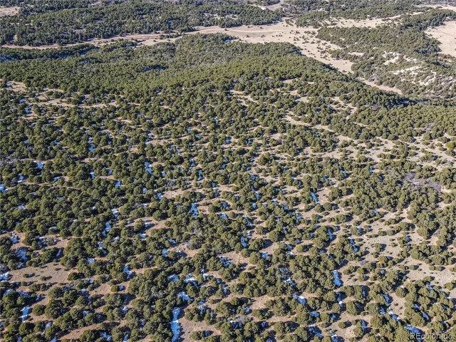 a view of mountains and valleys
