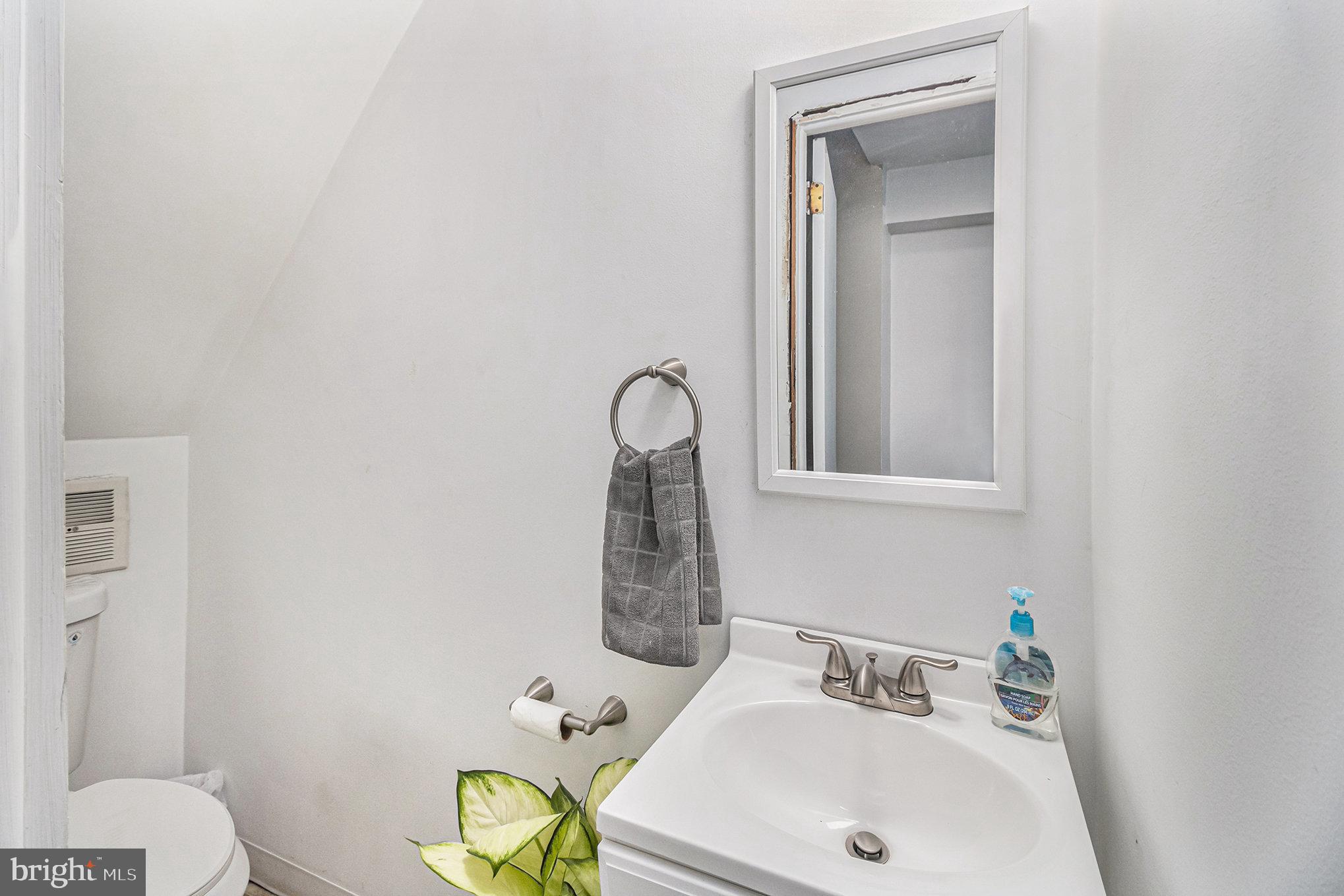 12206 Barbary Road Philadelphia, PA 19154 - Photo 17 of 28 a bathroom with a sink vanity and toilet