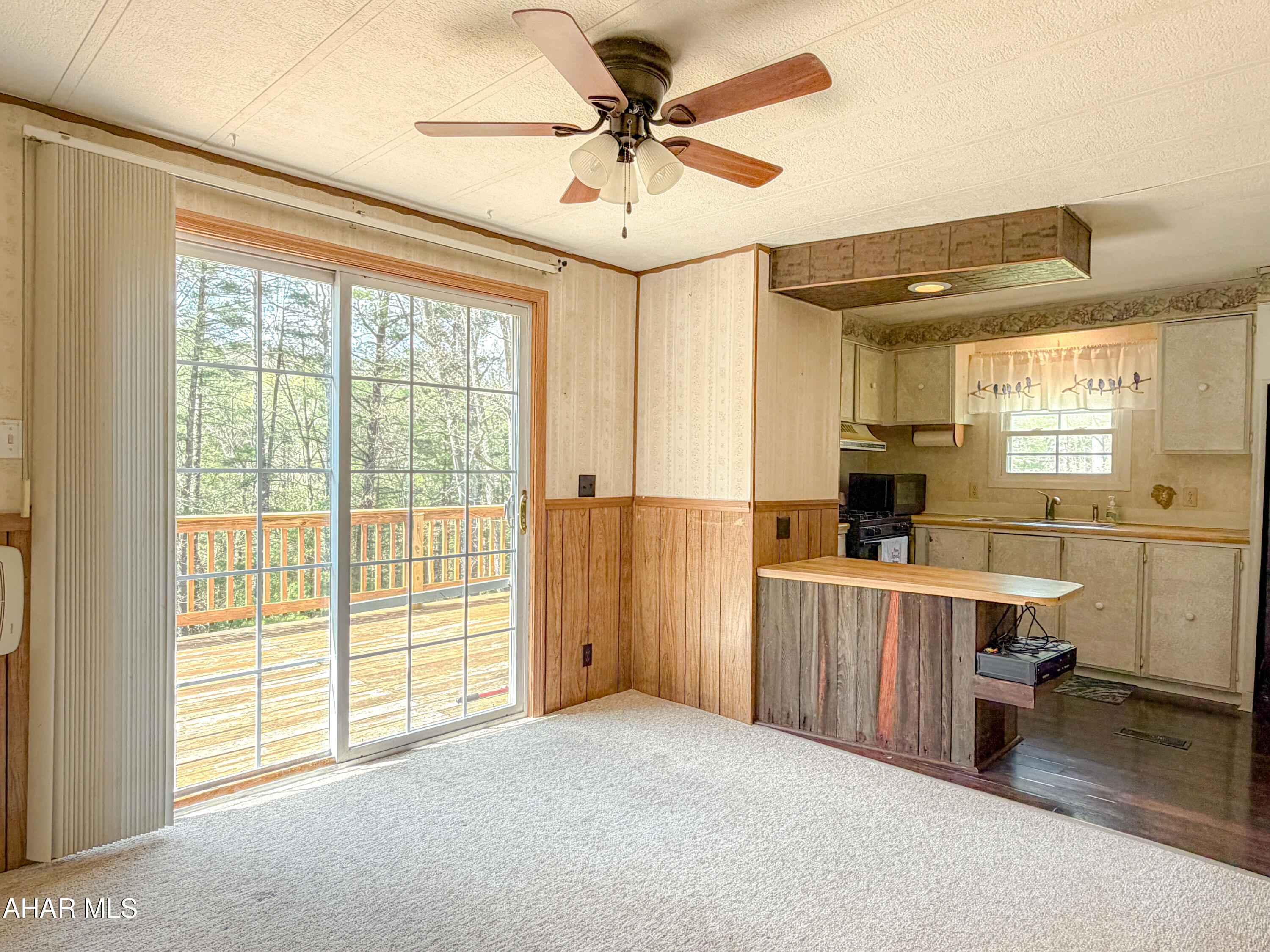 151 Pine Echo Road Everett, PA 15537 - Photo 22 of 51 a view of work space with windows and chandelier