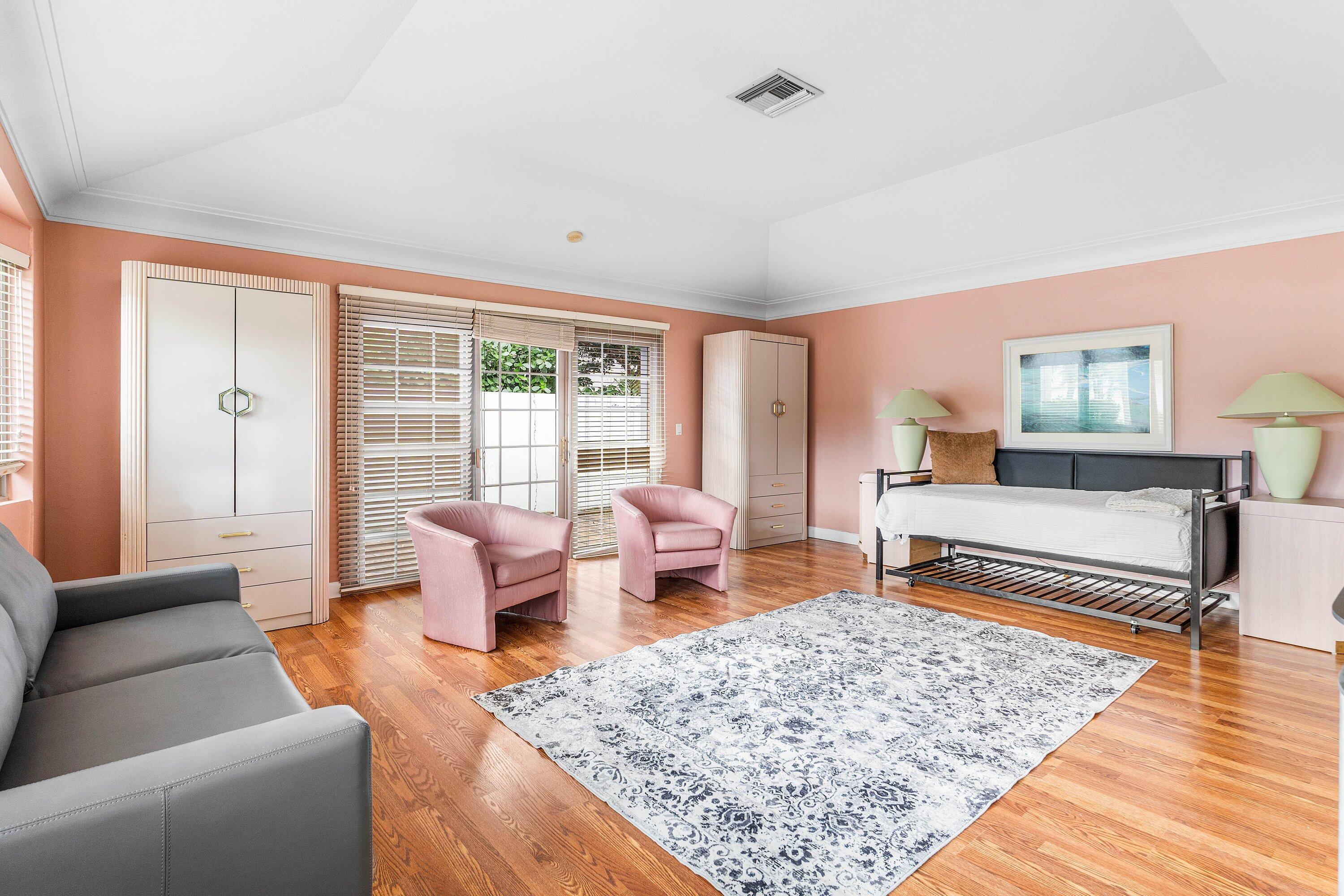 2041 Thatch Palm Drive Boca Raton, FL 33432 - Photo 17 of 45 a living room with furniture and a rug
