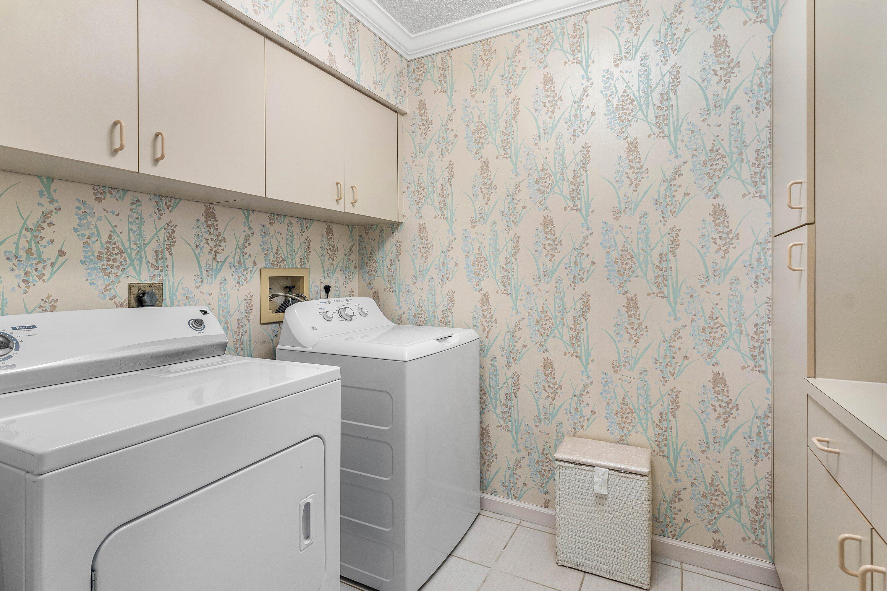 2041 Thatch Palm Drive Boca Raton, FL 33432 - Photo 36 of 45 a utility room with dryer and washer