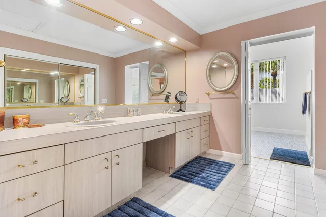 a view of a swimming pool with a lounge chairs