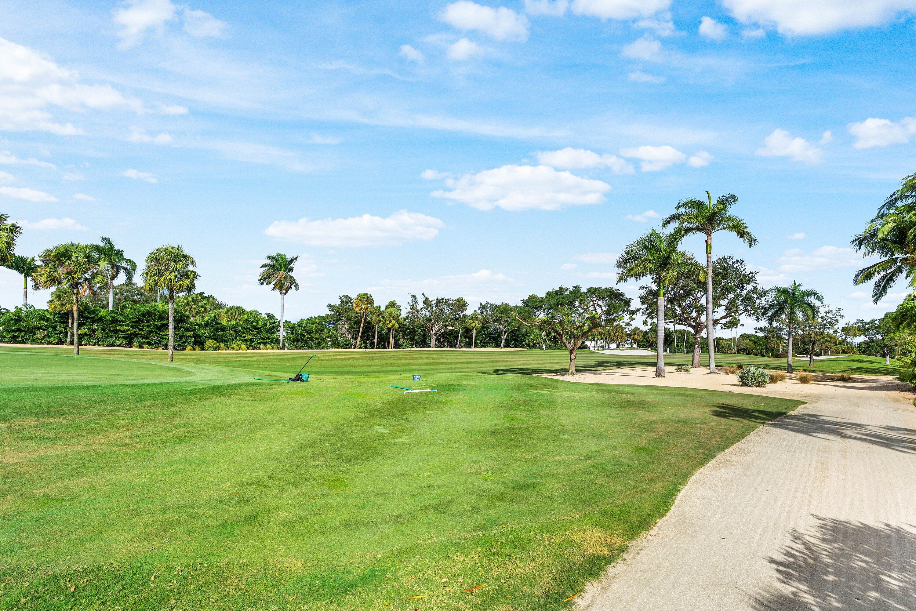 2041 Thatch Palm Drive Boca Raton, FL 33432 - Photo 45 of 45 a view of a golf course with a lake