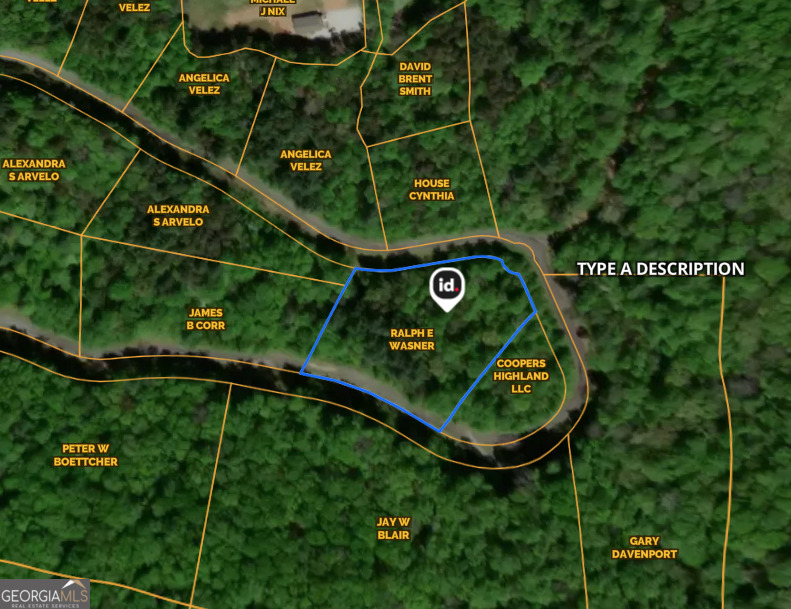 an aerial view of a wooden fence and a sign board