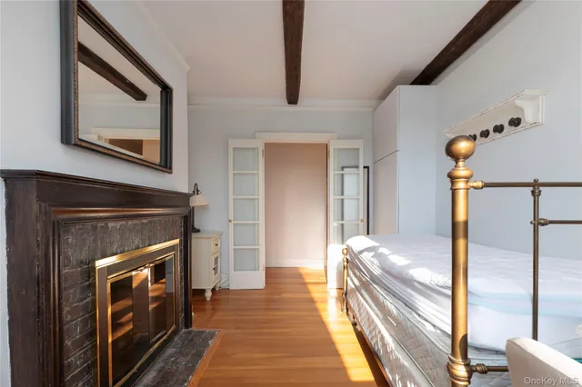 a room with a bed and a window