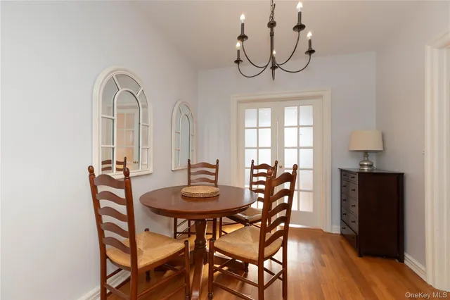 a bedroom with a bed and a fireplace with the outer view