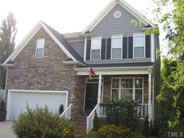 5218 Groveside Court Raleigh, NC 27613 - Photo 1 of 12 a front view of a house with plants