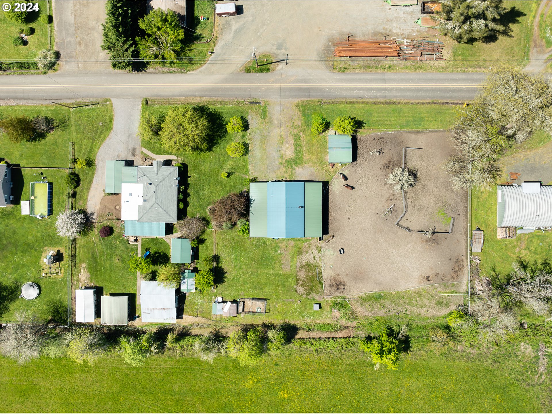 215 Northside Road Sutherlin, OR 97479 - Photo 40 of 40 an aerial view of a house with a yard swimming pool and outdoor seating