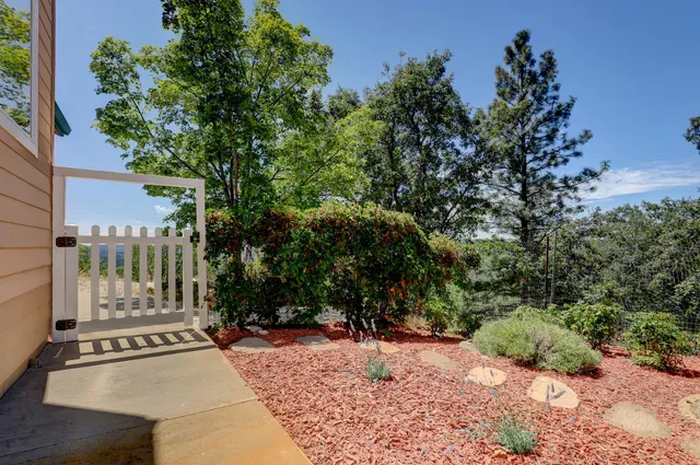 a front view of a house with patio