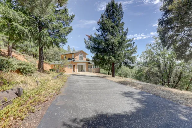 a spacious bathroom with a shower sink and mirror