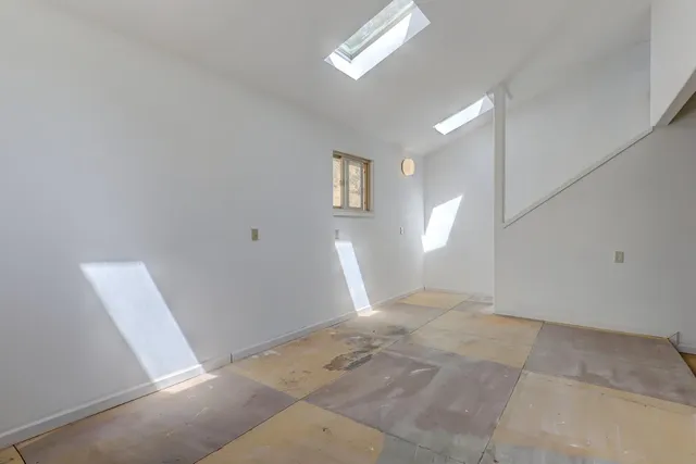 a view of a yard with a tree